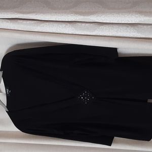 Embellished fashion top with 3/4 length sleeves.